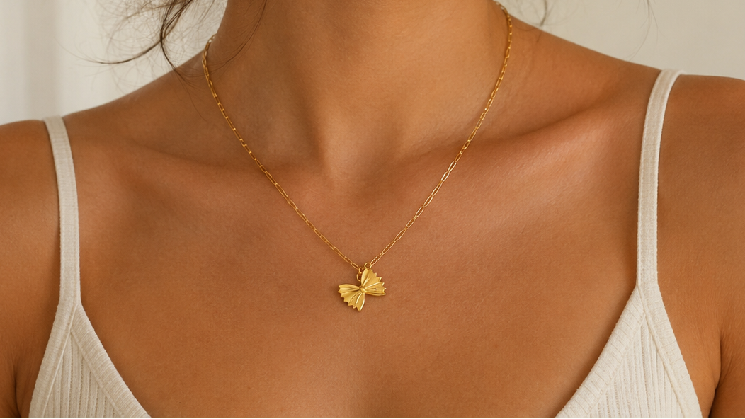 woman wearing farfalle pasta necklace